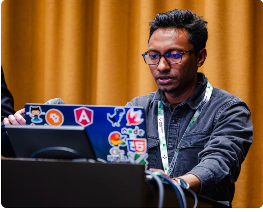 SohoPay engineer working at a developer conference