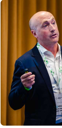 A SohoPay speaker presenting on stage
